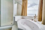 Soaking tub with beach views 
